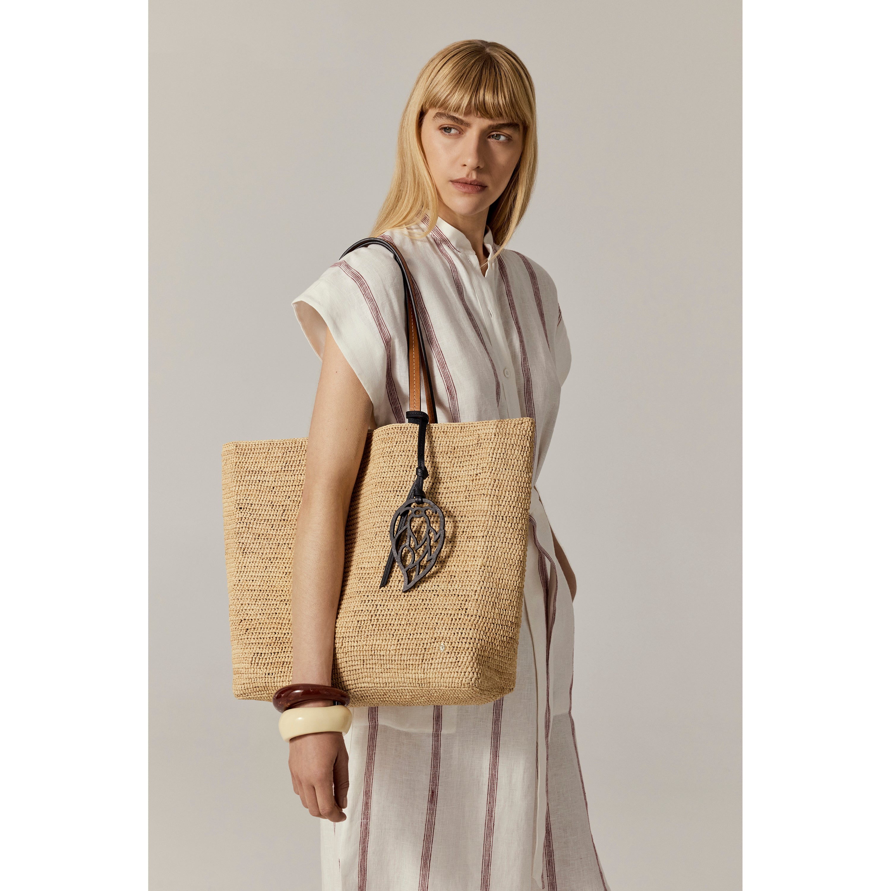 Buy Seed Logo Leather Charm - Helen Kaminski