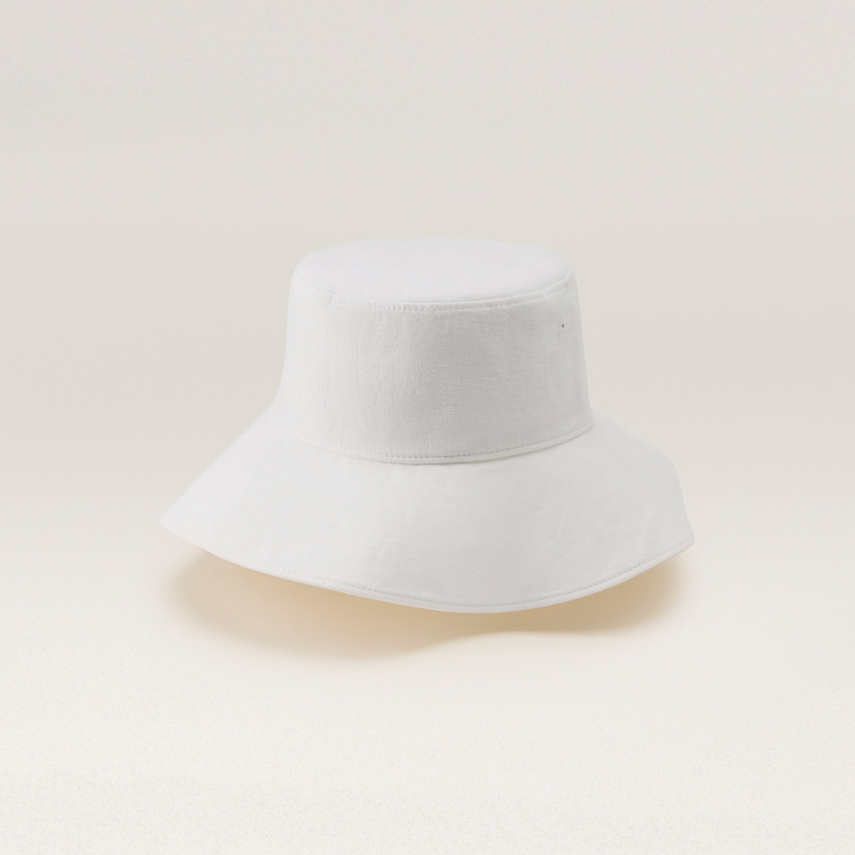Shop the Aria Medium Brim Bucket Hat in White | Helen Kaminski